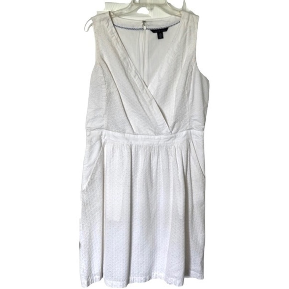 Tommy Hilfiger white eyelet dress with pockets crisscross neckline.Size  12.